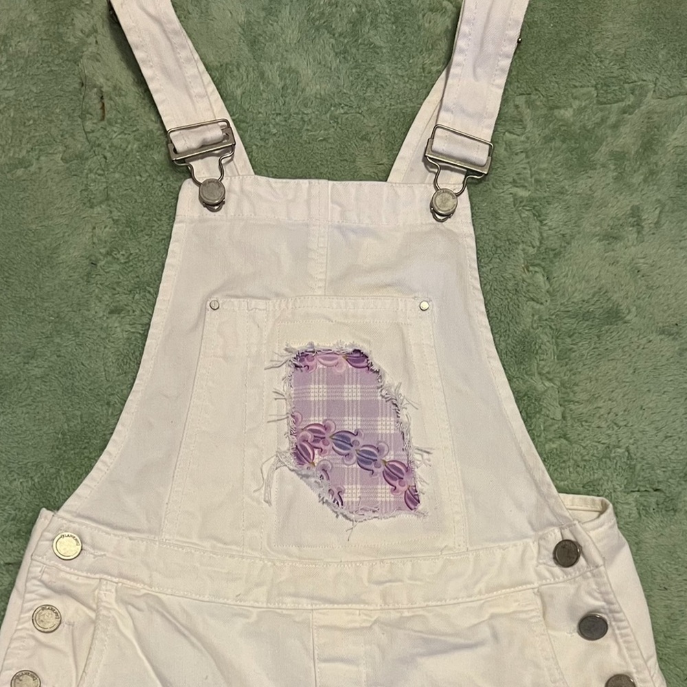 Upcycled BlankNYC Palaka and Crown Flower print overall shorts, white denim